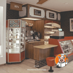 Vintage bakery interior with pig logo.