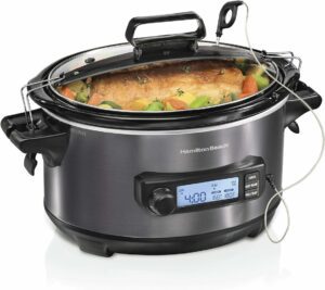 Hamilton Beach electric slow cooker with chicken and vegetables.