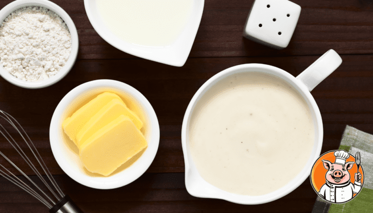 Ingrédients pour sauce béchamel sur table en bois.